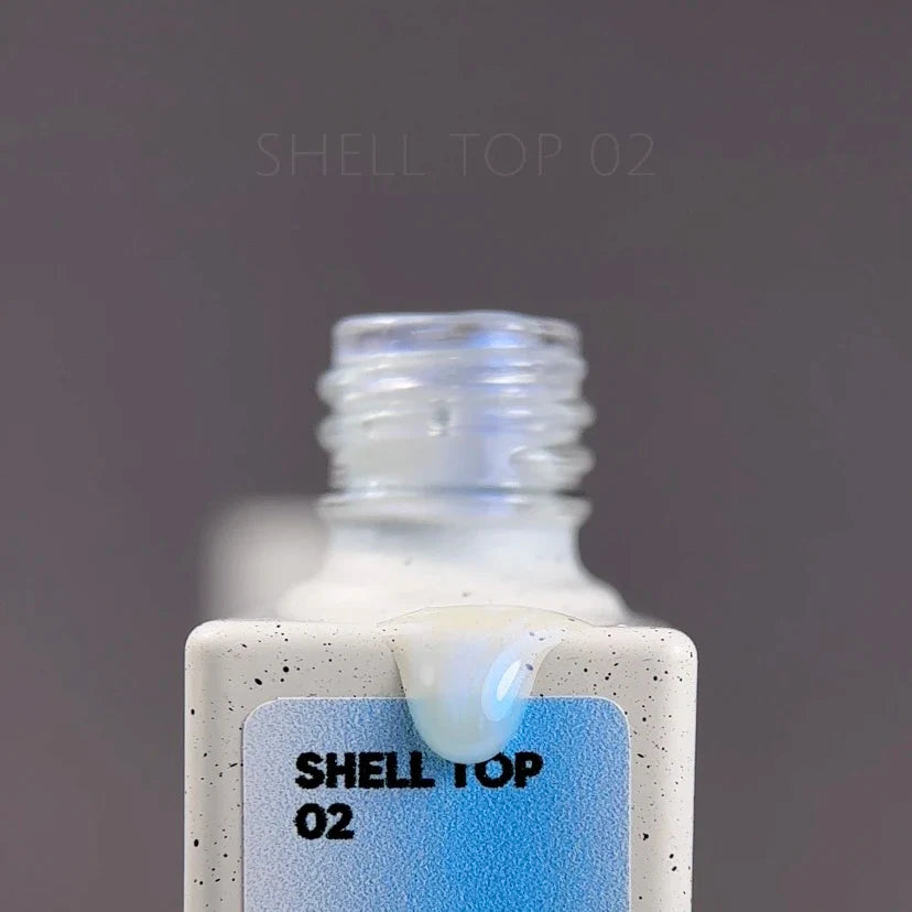 NAILSOFTHEDAY Shell top 02 nueva fórmula: un top perlado con una iridiscencia azul sin capa pegajosa, 10 ml