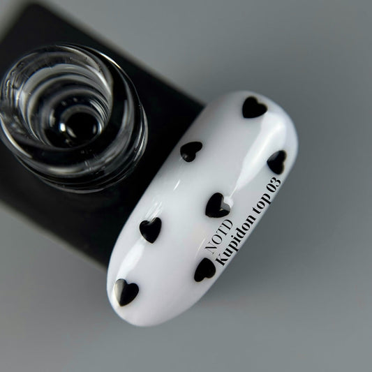NAILSOFTHEDAY Kupidon top 03 - acabado delicado para uñas con corazones negros intensos, sin capa pegajosa, 10 ml