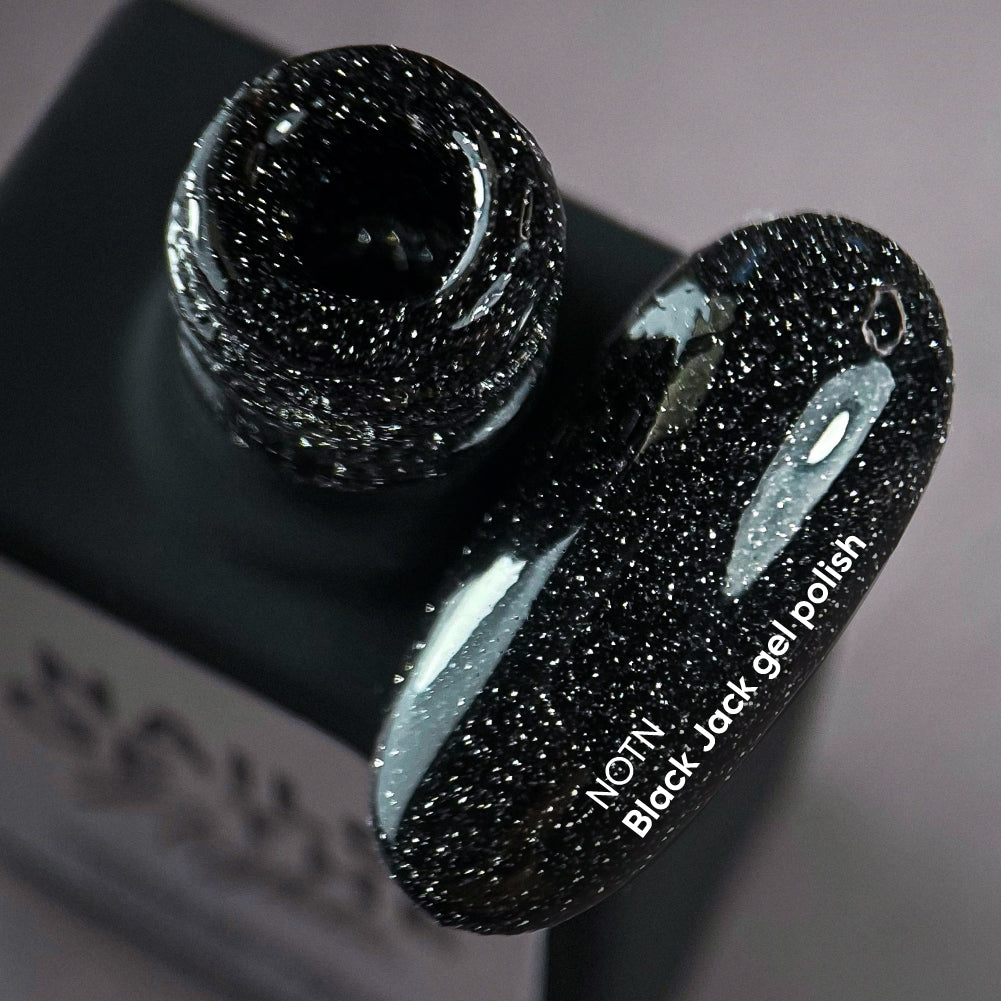 NAILSOFTHENIGHT Esmalte en gel Black Jack: esmalte en gel reflectante negro con brillo plateado para uñas, 10 ml