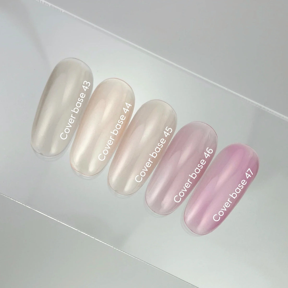 NAILSOFTHEDAY Cover base 47 light pigment: recubrimiento base translúcido de color rosa intenso ligeramente pigmentado para uñas, 10 ml